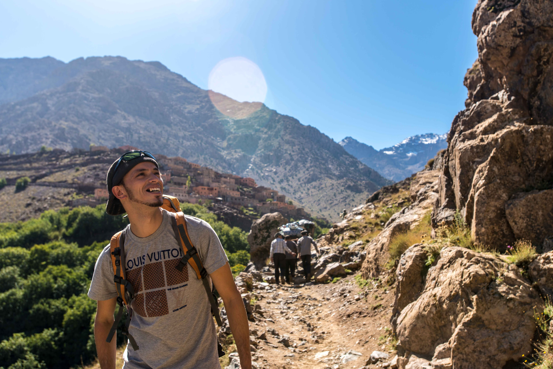 Toubkal Views guide leading a trek in the High Atlas Mountains